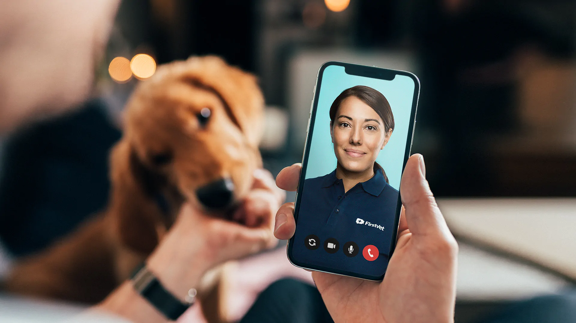 A picture of a customer on a FirstVet video call with a UK vet