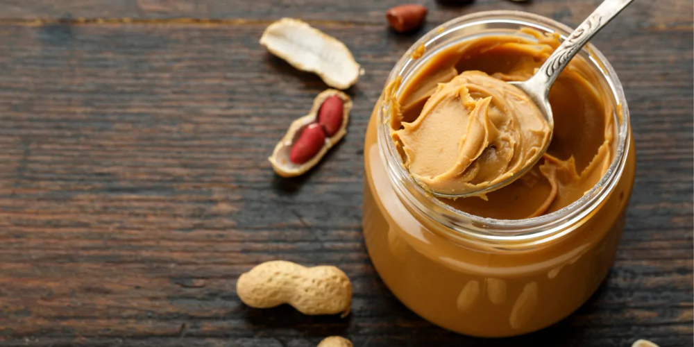 A picture of peanut butter, a human food cats can't eat